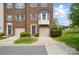 Charming brick townhome featuring an attached garage and a classic bay window at 7753 Jackson Pond Dr, Charlotte, NC 28273