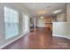 Bright, open-concept interior featuring hardwood floors and ample natural light at 8323 Carolina Laurel Ct, Charlotte, NC 28215