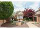 Charming community mailboxes surrounded by landscaping including a red Japanese maple and manicured shrubs at 879 Park Slope Dr, Charlotte, NC 28209