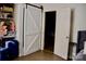 Bedroom featuring white barn doors and overhead lighting at 920 Squirrel Hill Rd, Charlotte, NC 28213