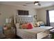 Cozy bedroom with a mirrored bed frame, plush pillows, and soft lighting, perfect for relaxation at 920 Squirrel Hill Rd, Charlotte, NC 28213