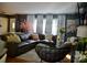 Cozy living room featuring a large leather sectional and stylish decor at 920 Squirrel Hill Rd, Charlotte, NC 28213