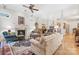 Inviting living room with a cozy fireplace, hardwood floors and elegant decor at 962 Blakeley Walk, Rock Hill, SC 29732