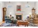 Comfortable living room with a fireplace, hardwood floors, and plenty of natural light at 962 Blakeley Walk, Rock Hill, SC 29732