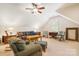 Spacious living room with comfortable seating, ceiling fan, and ample natural light at 962 Blakeley Walk, Rock Hill, SC 29732