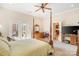 This primary bedroom offers a backyard view with access to a private patio area at 962 Blakeley Walk, Rock Hill, SC 29732