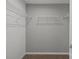 Walk-in closet offers metal shelving and plenty of space for organization and storage at 10033 Guardian Dr # 265, Charlotte, NC 28273
