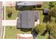 An overhead shot of a house with dark roofing and a long concrete driveway at 10937 Dry Stone Dr, Huntersville, NC 28078