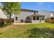 Backyard featuring a patio, an AC unit, and a fenced-in yard, offering privacy and space at 10937 Dry Stone Dr, Huntersville, NC 28078