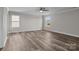 Expansive bedroom boasts plentiful light, and wood-look floors at 10937 Dry Stone Dr, Huntersville, NC 28078