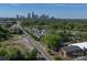 Aerial view of neighborhood and skyline, highlighting community and urban proximity at 1142 Mona Dr, Charlotte, NC 28206