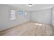 Bright bedroom with neutral tones, fresh paint, and new flooring at 1142 Mona Dr, Charlotte, NC 28206