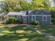 Charming single-story home with a well-manicured lawn and inviting front entrance at 1142 Mona Dr, Charlotte, NC 28206