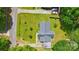 Aerial view of a house highlighting the roof, driveway, carport and landscaping at 116 Pelham Ln, Fort Mill, SC 29715