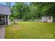 A big, lush backyard featuring a storage shed and partial fence at 116 Pelham Ln, Fort Mill, SC 29715