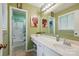 Bright bathroom with a vanity, sink, and shower-tub combination at 116 Pelham Ln, Fort Mill, SC 29715