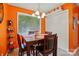 Inviting dining area with a wooden table, seating for four, and an abundance of natural light at 116 Pelham Ln, Fort Mill, SC 29715