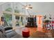 Open living area with vaulted ceilings, large windows and view to backyard at 116 Pelham Ln, Fort Mill, SC 29715