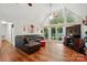 Spacious living room with vaulted ceilings, large windows, and modern furnishings at 116 Pelham Ln, Fort Mill, SC 29715