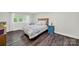 Cozy bedroom featuring stylish decor, a comfortable bed, and a bright window at 11914 Rock Canyon Dr, Charlotte, NC 28226