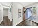 Inviting entryway boasting hardwood floors, neutral walls, and stylish decor leading into the home at 11914 Rock Canyon Dr, Charlotte, NC 28226