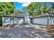 Charming home exterior featuring a well-maintained lawn, attached garage, and inviting curb appeal at 11914 Rock Canyon Dr, Charlotte, NC 28226