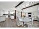 Bright and airy living room featuring a modern kitchen, vaulted ceilings and stone fireplace at 11914 Rock Canyon Dr, Charlotte, NC 28226