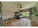 bedroom featuring a bunk bed, whimsical wallpaper, and a geometric rug at 12525 Hashanli Pl, Matthews, NC 28105