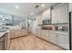 Modern kitchen featuring custom cabinetry, granite countertops, and stainless steel appliances at 12525 Hashanli Pl, Matthews, NC 28105