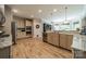 Spacious kitchen with granite countertops, stainless steel appliances, and hardwood floors at 12525 Hashanli Pl, Matthews, NC 28105