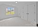 Neutral carpet in bedroom with natural light and closet storage at 130B Springway Dr, Kannapolis, NC 28081
