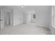 Clean bedroom with double door closet, plush neutral carpet, and white walls at 130B Springway Dr, Kannapolis, NC 28081