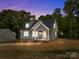 Inviting home exterior with manicured landscaping, showcasing a welcoming entrance and charming details at 130B Springway Dr, Kannapolis, NC 28081