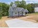 Gray home with a new concrete driveway at 130B Springway Dr, Kannapolis, NC 28081