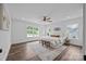 Spacious main bedroom with wood floors, a ceiling fan, and two large windows providing ample natural light at 130B Springway Dr, Kannapolis, NC 28081