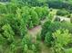 An aerial shot showcases lush greenery and the peaceful seclusion of the home at 1317 Requa Rd, Cherryville, NC 28021