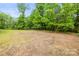 Vacant land with trees and some brush, perfect for building a home at 1317 Requa Rd, Cherryville, NC 28021