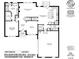 First floor plan featuring kitchen, primary bedroom, dining, living, and garage layouts at 1409 Bloomsberry Ln, Waxhaw, NC 28173
