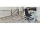 Upstairs office area with a modern desk setup and natural light at 1409 Bloomsberry Ln, Waxhaw, NC 28173