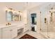 Bathroom featuring vanity area and tiled glass enclosed shower at 14131 Lea Point Ct, Huntersville, NC 28078