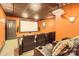 Home theater features tiered seating, projector, large screen, and cozy leather recliners for ultimate viewing experience at 14131 Lea Point Ct, Huntersville, NC 28078