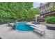 Inviting backyard pool featuring a diving board, in-pool basketball hoop, and ample space for lounging at 14131 Lea Point Ct, Huntersville, NC 28078