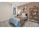 Charming bedroom with carpet, natural light, shelving and picture accent wall at 1419 5Th Street Ne Dr, Hickory, NC 28601