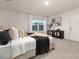 Bright bedroom with soft carpet, neutral walls, window, and stylish furnishings at 1419 5Th Street Ne Dr, Hickory, NC 28601