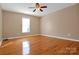 Bright bedroom with hardwood floors, neutral walls, and a window for natural light at 1537 Haupt Strasse None, Conover, NC 28613