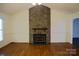 Spacious living room with a vaulted ceiling, stone fireplace, and beautiful hardwood flooring at 1537 Haupt Strasse None, Conover, NC 28613
