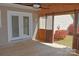 Inviting screened porch with a wood deck, doors to the outside, and a ceiling fan at 1537 Haupt Strasse None, Conover, NC 28613