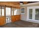 Covered porch with screened windows and wood plank flooring at 1537 Haupt Strasse None, Conover, NC 28613