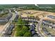 Aerial view showcases community amenities and proximity to Uptown Charlotte; the location of 1543 AB Moore Jr. Drive is marked at 1543 Ab Moore Jr Dr, Indian Trail, NC 28079