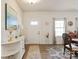 Inviting foyer area features hardwood floors, neutral walls, and a view of the front door and formal dining room at 1543 Ab Moore Jr Dr, Indian Trail, NC 28079